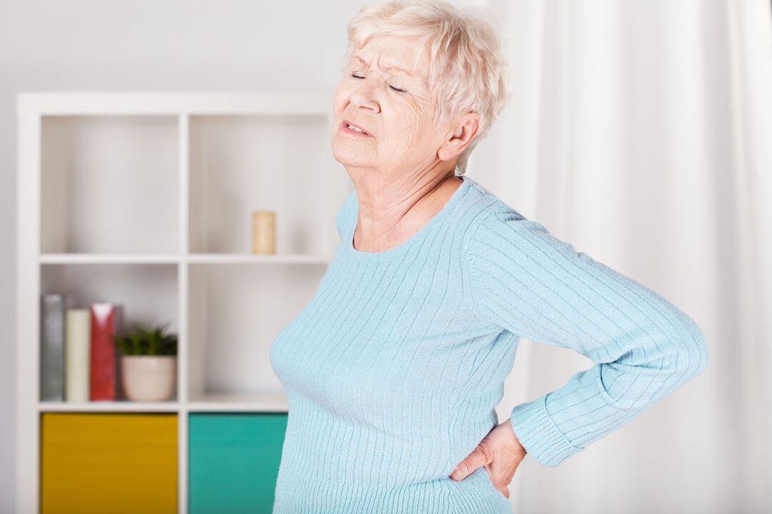 dor lombar em uma mulher pode ser a causa da osteocondrose