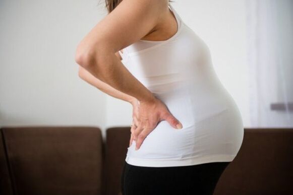 costas doem durante a gravidez qual adesivo vai ajudar